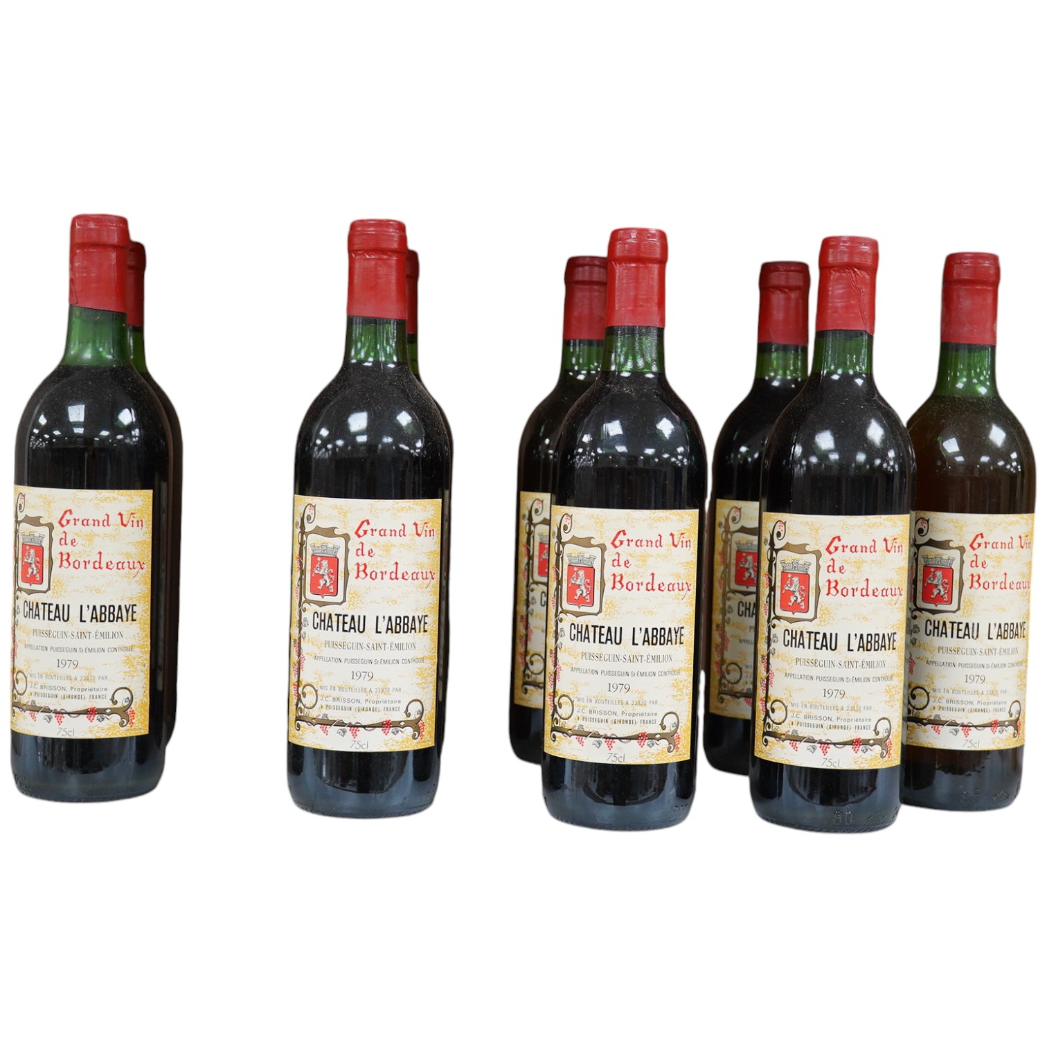 Nine bottles of Chateau L’Abbaye Puisseguin-Saint-Emilion 1979 red wine. Condition - fair to good